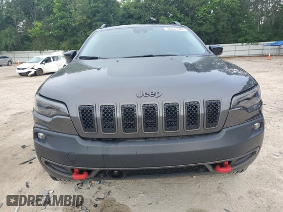 2022 Jeep Cherokee Trailhawk с VIN 1C4PJMBX1ND529146, выставлен на аукционе Copart как лот 56237365 с пробегом 26 718 миль миль и Списание • Salvage title. История ставок и продаж доступна на DreamBid. Изображение 5.