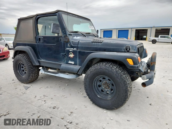 2000 Jeep Wrangler Sahara with VIN 1J4FA59S1YP777549, listed as a Copart auction lot 63622335 with 197,426 mi miles and Clean title. Bid and sale history available at DreamBid. Image 4.