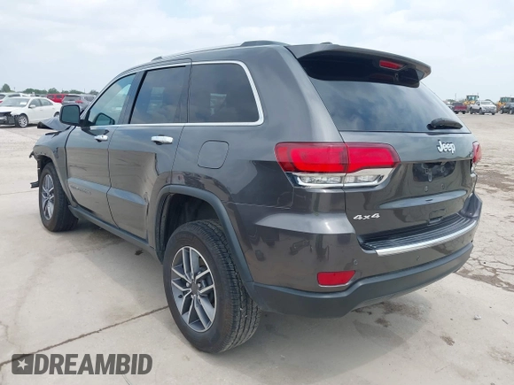 2021 Jeep Grand Cherokee 80th Anniversary with VIN 1C4RJFBG0MC504148, listed as a IAAI auction lot 42063979 with 77,941 mi miles and . Bid and sale history available at DreamBid. Image 3.