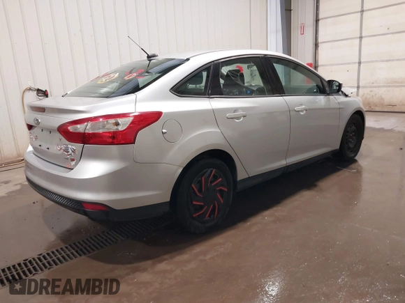 2012 Ford Focus SE with VIN 1FAHP3F21CL284921, listed as a IAAI auction lot 42054351 with 164,377 mi miles and . Bid and sale history available at carsss.com. Image 4.