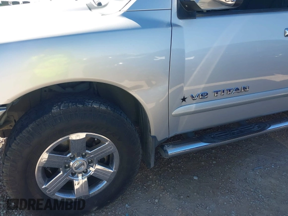 2011 Nissan Titan SV with VIN 1N6BA0ED7BN318878, listed as a IAAI auction lot 41518618 with 169,890 mi miles and . Bid and sale history available at DreamBid. Image 6.