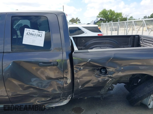 2020 Ram 1500 Tradesman with VIN 1C6RR6FG7LS114615, listed as a IAAI auction lot 42061182 with 97,341 mi miles and . Bid and sale history available at DreamBid. Image 6.