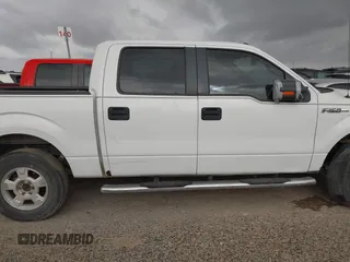 2014 Ford F-150 XL with VIN 1FTFW1EF1EFC93570, listed as a IAAI auction lot 41652787 with 265,015 mi miles. Bid and sale history available at carsss.com. Image 13.