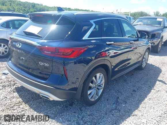 2022 Infiniti QX50 Luxe z VIN 3PCAJ5BA9NF108288, wystawiony jako IAAI lot #42646497 z przebiegiem 65 145 mil mil oraz . Historia ofert i sprzedaży dostępna na DreamBid. Obrazek 4.