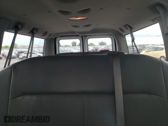 2008 Ford Econoline Passenger XL with VIN 1FMNE11W58DB33613, listed as a Copart auction lot 59142445 with 70,107 mi miles and Salvage title. Bid and sale history available at DreamBid. Image 10.