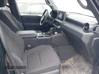 2024 Toyota Land Cruiser z VIN JTEABFAJ6RK007928, wystawiony jako IAAI lot #41575919 z przebiegiem 9282 mil mil oraz . Historia ofert i sprzedaży dostępna na DreamBid. Obrazek 5.
