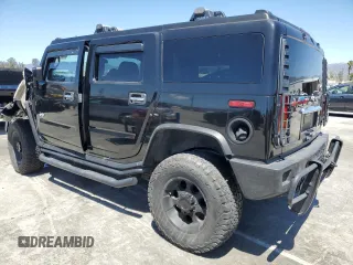2003 Hummer H2 with VIN 5GRGN23U73H122529, listed as a Copart auction lot 50157934 with 0 mi miles and Salvage Title. Bid and sale history available at carsss.com. Image 2.