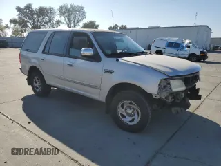 1997 Ford Expedition XLT z VIN 1FMEU1768VLA49281, wystawiony jako Copart lot #79895244 z przebiegiem 73 188 mil mil oraz Szkoda całkowita • Salvage title. Historia ofert i sprzedaży dostępna na DreamBid. Obrazek 4.