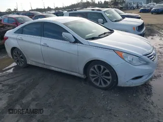 2014 Hyundai Sonata SE with VIN 5NPEC4AC0EH833661, listed as a IAAI auction lot 41445286 with 133,341 mi miles and . Bid and sale history available at DreamBid. Image 1.