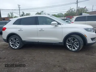 2017 Lincoln MKX Reserve with VIN 2LMPJ8LR5HBL14872, listed as a IAAI auction lot 42244881 with 110,991 mi miles and . Bid and sale history available at DreamBid. Image 13.