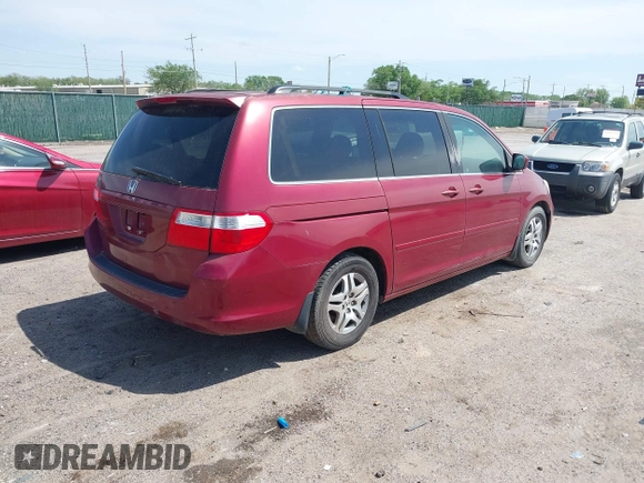 2006 Honda Odyssey EX with VIN 5FNRL38456B113072, listed as a IAAI auction lot 42112693 with 238,883 mi miles. Bid and sale history available at carsss.com. Image 4.