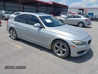 2013 BMW 3 Series 328i with VIN WBA3C1G5XDNR45054, listed as a IAAI auction lot 42504007 with 152,705 mi miles and . Bid and sale history available at DreamBid. Image 1.