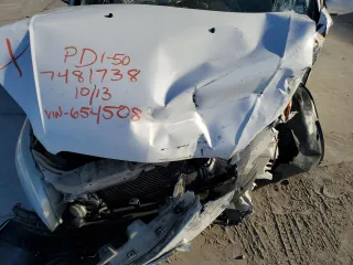 2009 Pontiac G3 z VIN KL2TD66E09B654508, wystawiony jako Copart lot #79963784 z przebiegiem Nie podano mil oraz Szkoda całkowita • Salvage title. Historia ofert i sprzedaży dostępna na DreamBid. Obrazek 12.