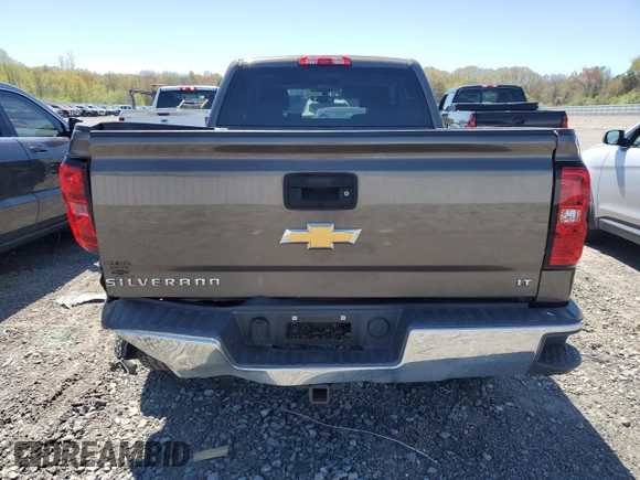 2014 Chevrolet Silverado 1500 LT with VIN 1GCRCREHXEZ197974, listed as a Copart auction lot 54946335 with 143,376 mi miles and Clean Title. Bid and sale history available at DreamBid. Image 6.