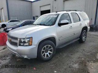 2012 Chevrolet Tahoe LS with VIN 1GNSCAE01CR232256, listed as a Copart auction lot 43985175 with 148,223 mi miles and Salvage title. Bid and sale history available at DreamBid. Image 1.