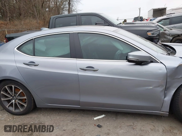 2015 Acura TLX V6 Tech with VIN 19UUB3F58FA005919, listed as a IAAI auction lot 41245647 with 110,505 mi miles. Bid and sale history available at carsss.com. Image 14.