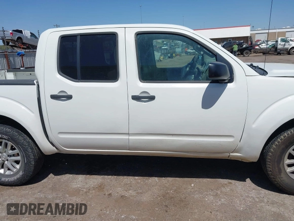2015 Nissan Frontier SV with VIN 1N6AD0ER9FN732989, listed as a IAAI auction lot 42013726 with 147,596 mi miles and . Bid and sale history available at DreamBid. Image 13.