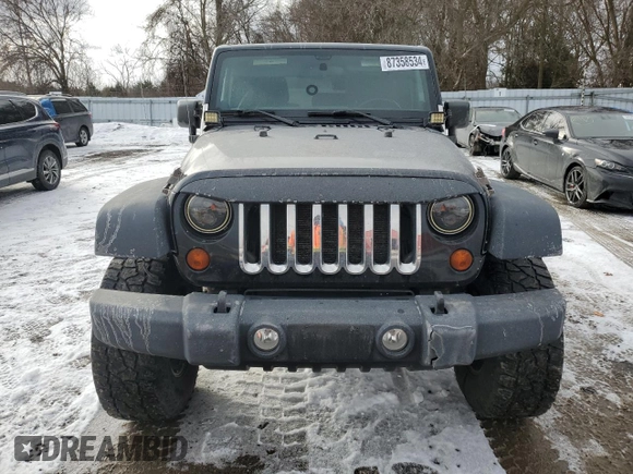 2011 Jeep Wrangler Rubicon with VIN 1J4BA6D1XBL556808, listed as a Copart auction lot 87358534 with 196,139 mi miles and Clean Title. Bid and sale history available at carsss.com. Image 5.