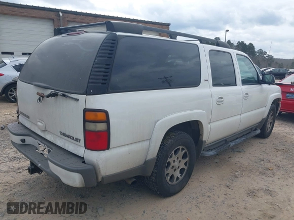 2005 Chevrolet Suburban LT z VIN 3GNEC16Z05G221875, wystawiony jako IAAI lot #41723132 z przebiegiem 253 542 mil mil oraz . Historia ofert i sprzedaży dostępna na DreamBid. Obrazek 4.