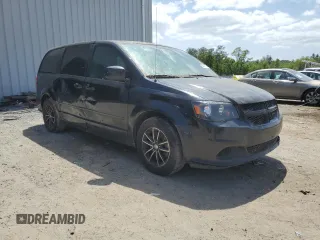 2015 Dodge Grand Caravan American Value with VIN 2C4RDGBG7FR703916, listed as a Copart auction lot 54830915 with 197,539 mi miles and Clean Title. Bid and sale history available at DreamBid. Image 4.