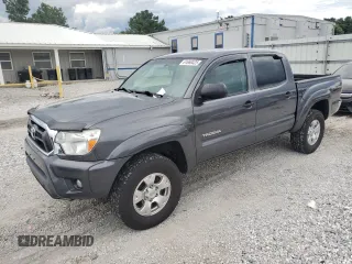 2014 Toyota Tacoma with VIN 3TMLU4EN7EM145618, listed as a Copart auction lot 61660425 with 126,140 mi miles and Salvage title. Bid and sale history available at DreamBid. Image 1.