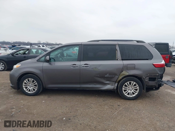 2016 Toyota Sienna XLE with VIN 5TDYK3DC8GS704330, listed as a IAAI auction lot 41586880 with 84,065 mi miles. Bid and sale history available at carsss.com. Image 15.