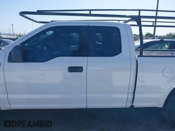 2015 Ford F-150 XL with VIN 1FTEX1C89FFC78555, listed as a IAAI auction lot 41989102 with 216,655 mi miles. Bid and sale history available at carsss.com. Image 14.
