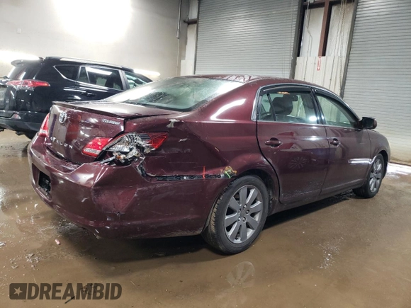 2005 Toyota Avalon XL with VIN 4T1BK36B15U037647, listed as a Copart auction lot 50807565 with 324,768 mi miles and Salvage Title. Bid and sale history available at DreamBid. Image 3.