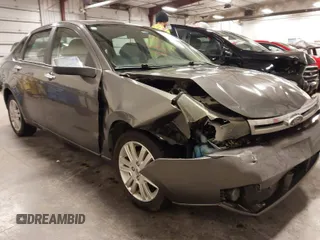 2011 Ford Focus SEL with VIN 1FAHP3HN9BW143616, listed as a IAAI auction lot 41694436 with 102,272 mi miles. Bid and sale history available at carsss.com. Image 1.