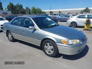 2001 Toyota Camry CE with VIN JT2BG22K810539653, listed as a IAAI auction lot 42236078 with 241,250 mi miles and . Bid and sale history available at carsss.com. Image 1.