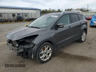 2016 Ford Escape Titanium with VIN 1FMCU9J95GUC17688, listed as a Copart auction lot 53234575 with 124,030 mi miles and Salvage Title. Bid and sale history available at DreamBid. Image 1.