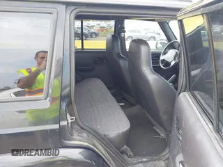 2000 Jeep Cherokee z VIN 1J4FF48S2YL190863, wystawiony jako IAAI lot #42820115 z przebiegiem 133 296 mil mil oraz . Historia ofert i sprzedaży dostępna na DreamBid. Obrazek 8.
