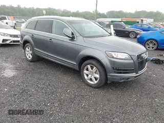 2013 Audi Q7 Premium Plus z VIN WA1LGAFE1DD013396, wystawiony jako IAAI lot #42502958 z przebiegiem 137 312 mil mil oraz . Historia ofert i sprzedaży dostępna na DreamBid. Obrazek 1.