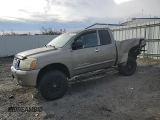2006 Nissan Titan SE with VIN 1N6BA06B36N575815, listed as a Copart auction lot 79679104 with Not Provided miles and Salvage Title. Bid and sale history available at carsss.com. Image 1.