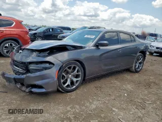 2015 Dodge Charger SXT with VIN 2C3CDXHGXFH879849, listed as a Copart auction lot 59010845 with 239,754 mi miles and Salvage title. Bid and sale history available at DreamBid. Image 1.