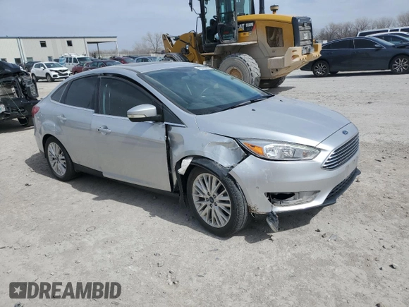 2017 Ford Focus Titanium with VIN 1FADP3J23HL347739, listed as a Copart auction lot 49385365 with 79,484 mi miles and Salvage title. Bid and sale history available at DreamBid. Image 4.