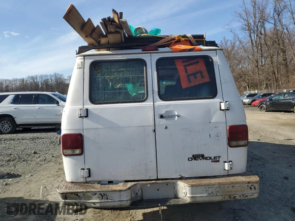 1995 Chevrolet Chevy Van z VIN 1GCEG25Z1SF202088, wystawiony jako Copart lot #44373315 z przebiegiem 184 821 mil mil oraz Szkoda całkowita • Salvage title. Historia ofert i sprzedaży dostępna na DreamBid. Obrazek 6.