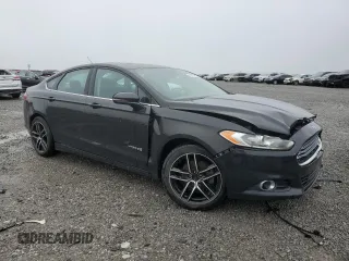 2014 Ford Fusion SE Hybrid with VIN 3FA6P0LU8ER156336, listed as a Copart auction lot 51974765 with 180,814 mi miles and Clean Title. Bid and sale history available at DreamBid. Image 4.