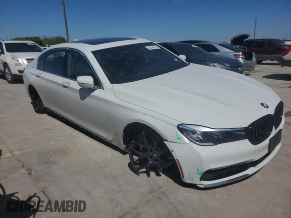 2018 BMW 7 Series 740i xDrive with VIN WBA7E4C52JGV24125, listed as a Copart auction lot 48164214 with 77,695 mi miles. Bid and sale history available at carsss.com. Image 4.