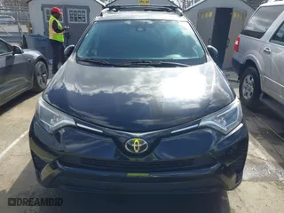 2018 Toyota RAV4 LE with VIN 2T3ZFREV9JW457062, listed as a IAAI auction lot 41696609 with 96,716 mi miles. Bid and sale history available at carsss.com. Image 12.