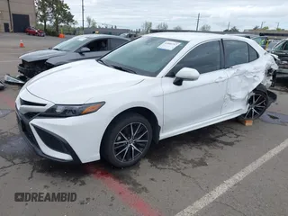 2023 Toyota Camry SE with VIN 4T1G11AK2PU822122, listed as a IAAI auction lot 41880757 with 56,106 mi miles and . Bid and sale history available at DreamBid. Image 2.