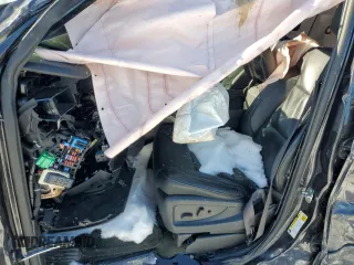 2015 Chevrolet Tahoe LTZ z VIN 1GNSKCKC8FR223832, wystawiony jako Copart lot #87023514 z przebiegiem Nie podano mil oraz Szkoda całkowita • Salvage title. Historia ofert i sprzedaży dostępna na DreamBid. Obrazek 7.
