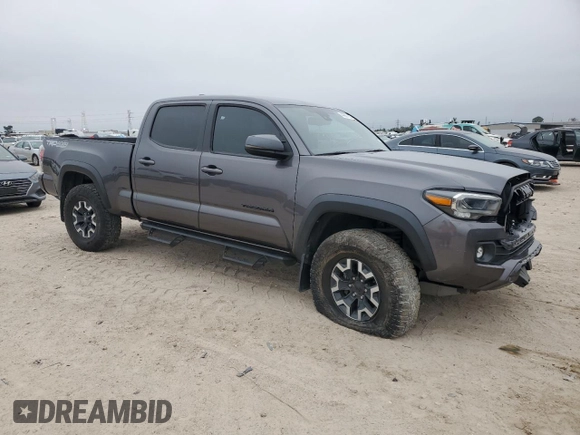 2021 Toyota Tacoma 4WD SR5 with VIN 5TFDZ5BN8MX062787, listed as a Copart auction lot 44987135 with 59,351 mi miles and Salvage Title. Bid and sale history available at carsss.com. Image 4.