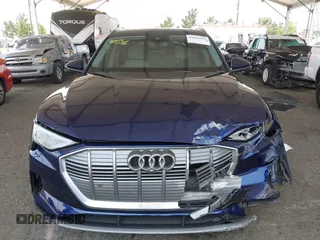2021 Audi e-tron Premium Plus with VIN WA1LAAGE4MB038563, listed as a IAAI auction lot 42422063 with 31,645 mi miles and . Bid and sale history available at DreamBid. Image 13.