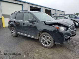 2017 Subaru Forester Touring with VIN JF2SJATC7HH437543, listed as a Copart auction lot 60866985 with 50,532 mi miles and Salvage title. Bid and sale history available at DreamBid. Image 4.