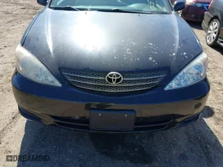 2003 Toyota Camry LE with VIN 4T1BE32K93U134041, listed as a IAAI auction lot 41834634 with 999,999 mi miles. Bid and sale history available at carsss.com. Image 6.
