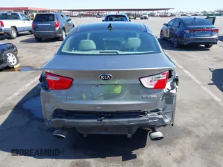 2014 Kia Optima EX z VIN 5XXGN4A72EG339786, wystawiony jako IAAI lot #42328516 z przebiegiem 103 035 mil mil oraz . Historia ofert i sprzedaży dostępna na DreamBid. Obrazek 17.