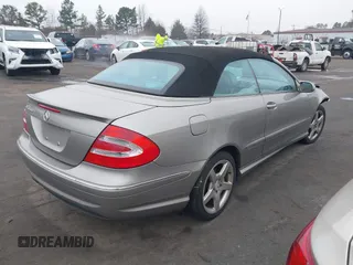 2005 Mercedes-Benz CLK 500 with VIN WDBTK75GX5T045909, listed as a IAAI auction lot 41173758 with 195,597 mi miles and . Bid and sale history available at DreamBid. Image 4.