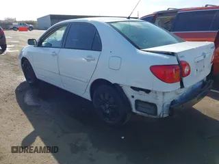 2004 Toyota Corolla CE with VIN JTDBR32E540051928, listed as a IAAI auction lot 41958483 with 299,999 mi miles. Bid and sale history available at carsss.com. Image 3.