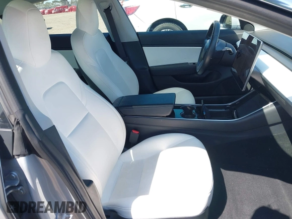 2018 Tesla Model 3 Long Range Battery with VIN 5YJ3E1EB5JF100578, listed as a IAAI auction lot 41959766 with 57,931 mi miles and . Bid and sale history available at DreamBid. Image 5.